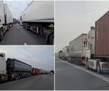 Şoferi de TIR disperaţi, fără apă şi mâncare, pe podul de la Agigea. Au ...